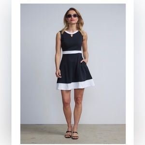 New York and Company NWT Black and White Piped Flare Dress. Size M